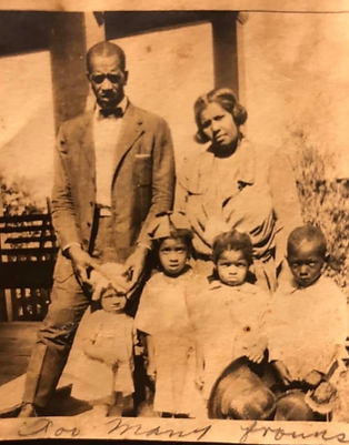 Pictured: Chester and Cornelia Whitlow with three of their daughters and a cousin.